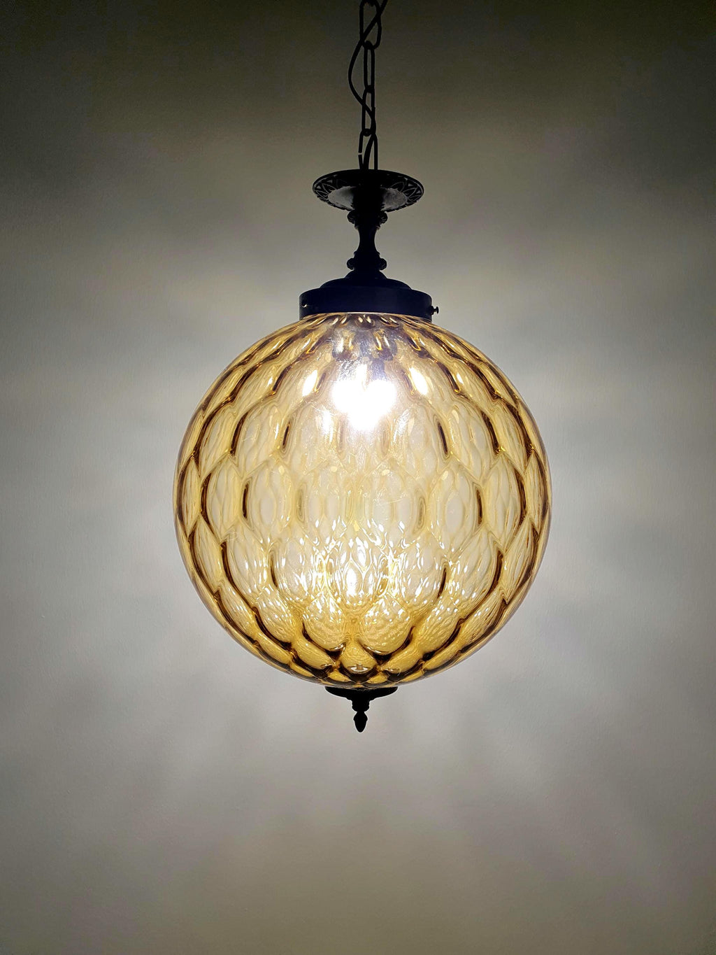 Vintage Murano glass caramel honeycomb globe pendant light on brass fitting, 1960s–70s, Italy
