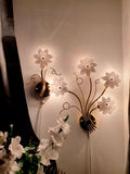 Asymmetrical pair of vintage Italian Murano glass floral wall sconces, white glass flower shades on gold-toned metal frames, 5 blooms total