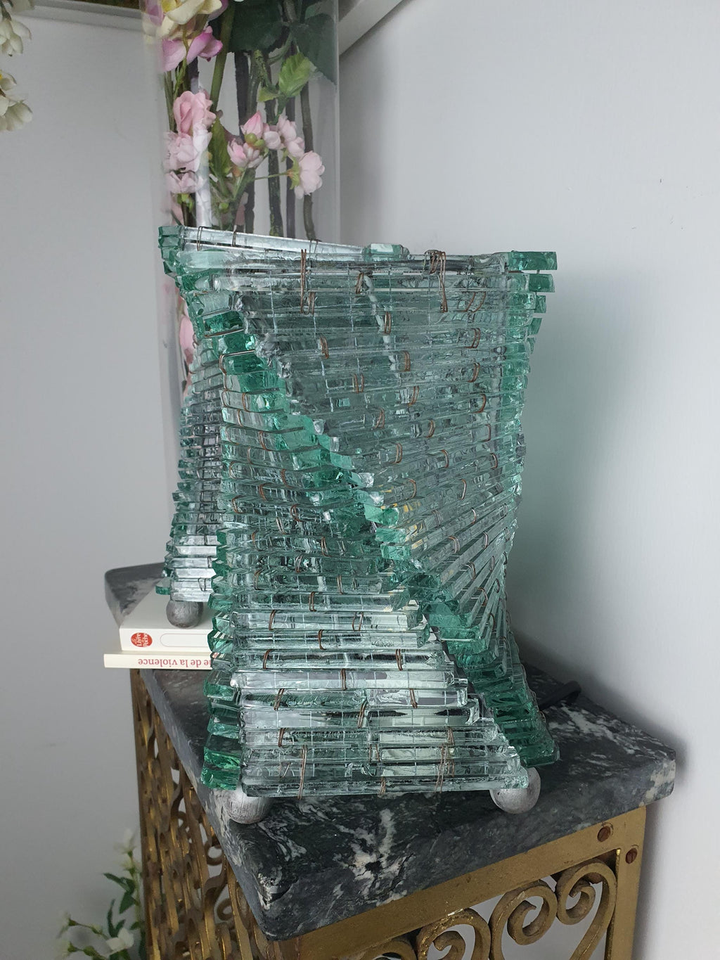 Glass segment edges on a handcrafted recycled glass lamp

