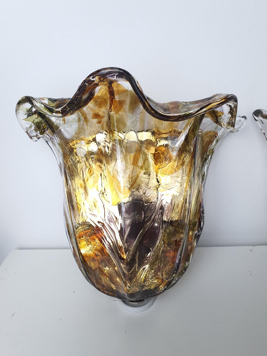 Orange, purple and green Murano glass in a tulip-shaped wall light
