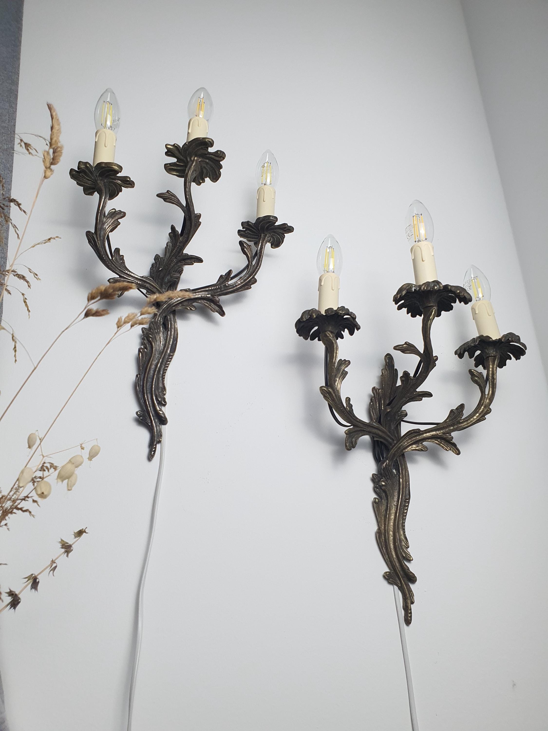 Pair of handcrafted Gothic 3-arm candle wall sconces — dark grey metal, full view

