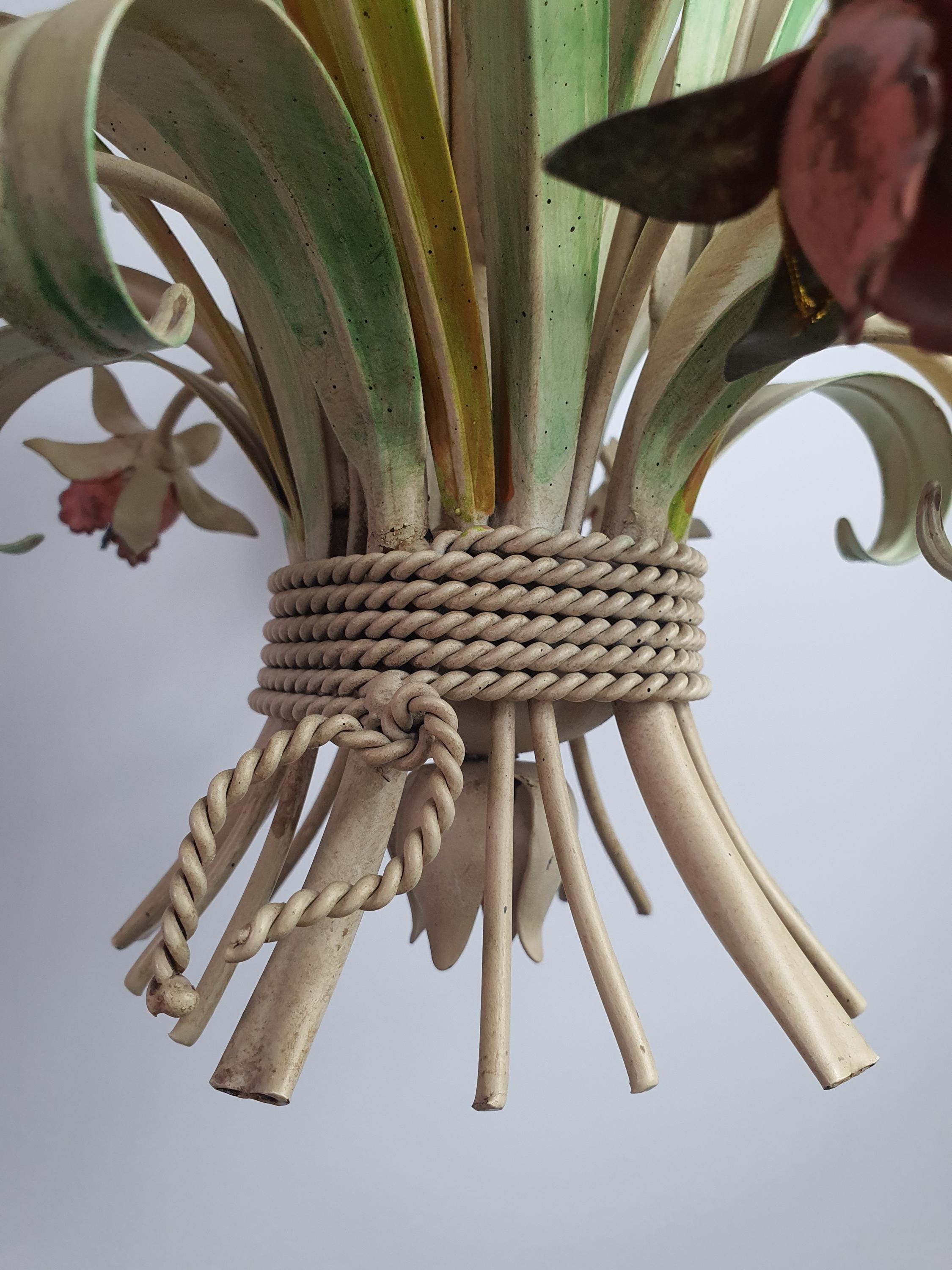 Vintage tole chandelier — rustic elegant floral arrangement, bohemian interior setting