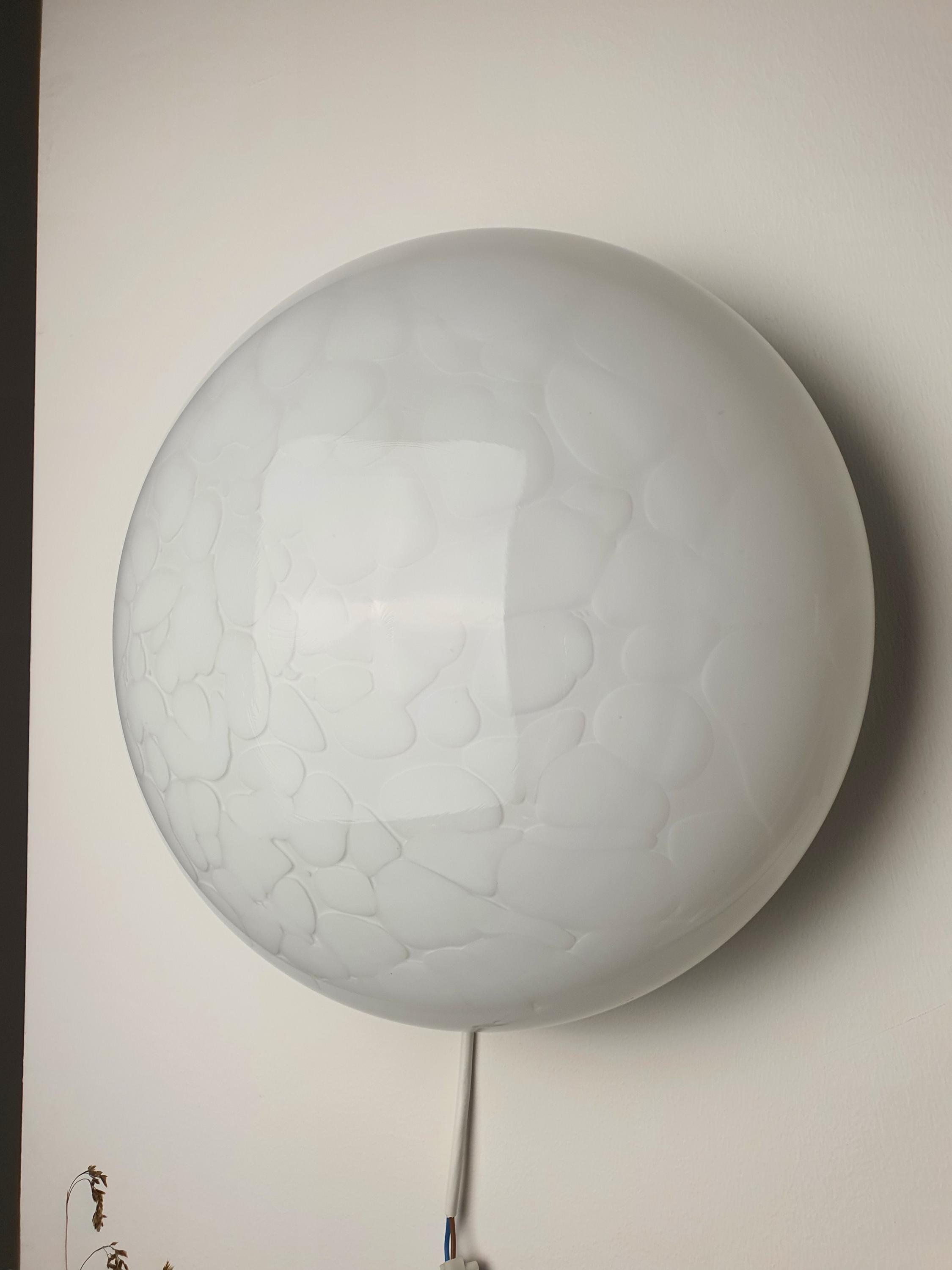 Vintage Italian moonstone Murano glass flush mount lit, soft even glow through layered white spotted glass