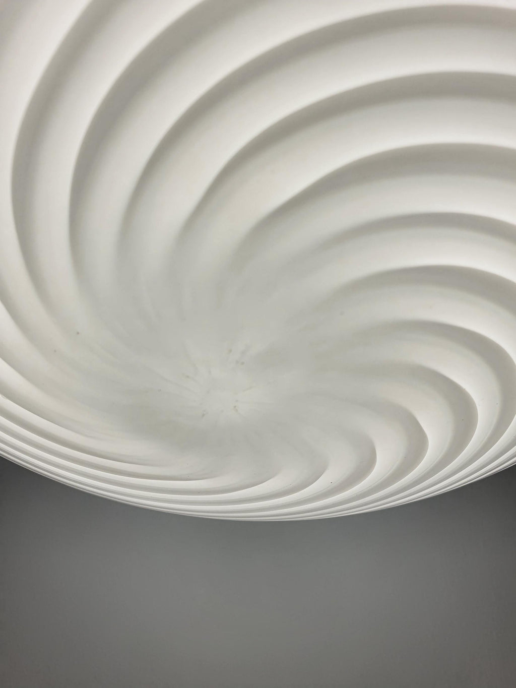 White Filigrana swirl pattern in a vintage Murano glass globe shade
