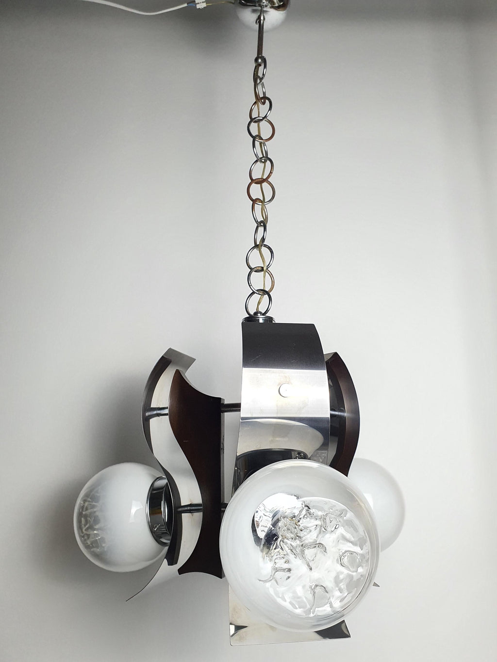 Mazzega-style Murano glass chandelier front view, three white-to-clear globes with drop relief, chrome metal structure