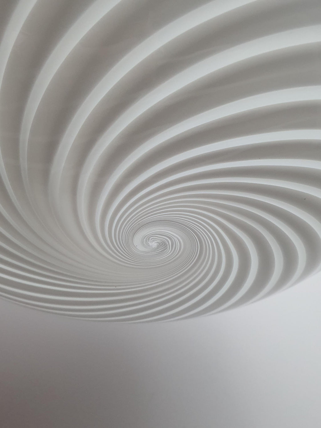White swirl pattern detail on vintage Murano glass globe pendant, hand-blown glass texture, 1960s–1980s Italy
