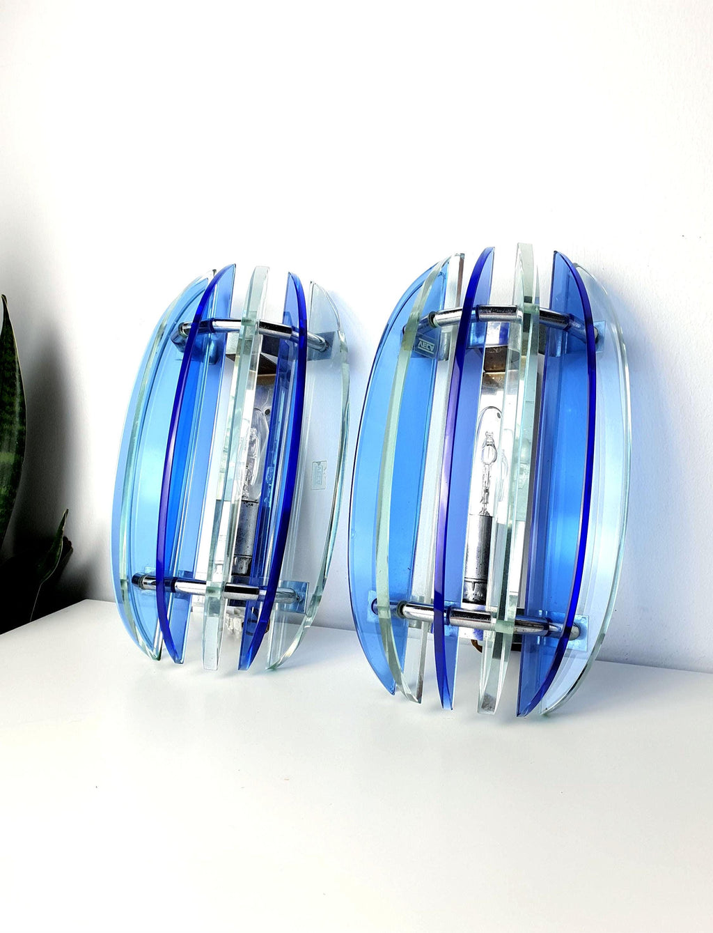 Pair of vintage Veca blue UFO wall sconces — cobalt pressed glass, Space Age design, front view