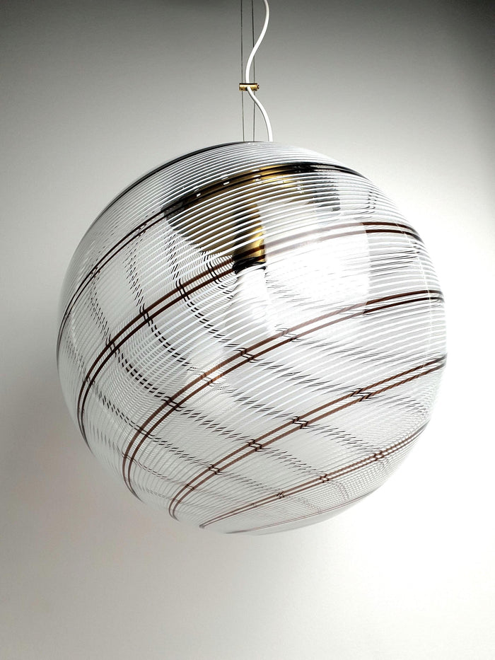 Vintage Murano glass globe pendant with white and brown filigree swirls
