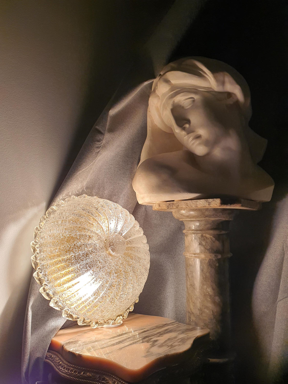 Low-profile Italian glass ceiling light with a layered shell design
