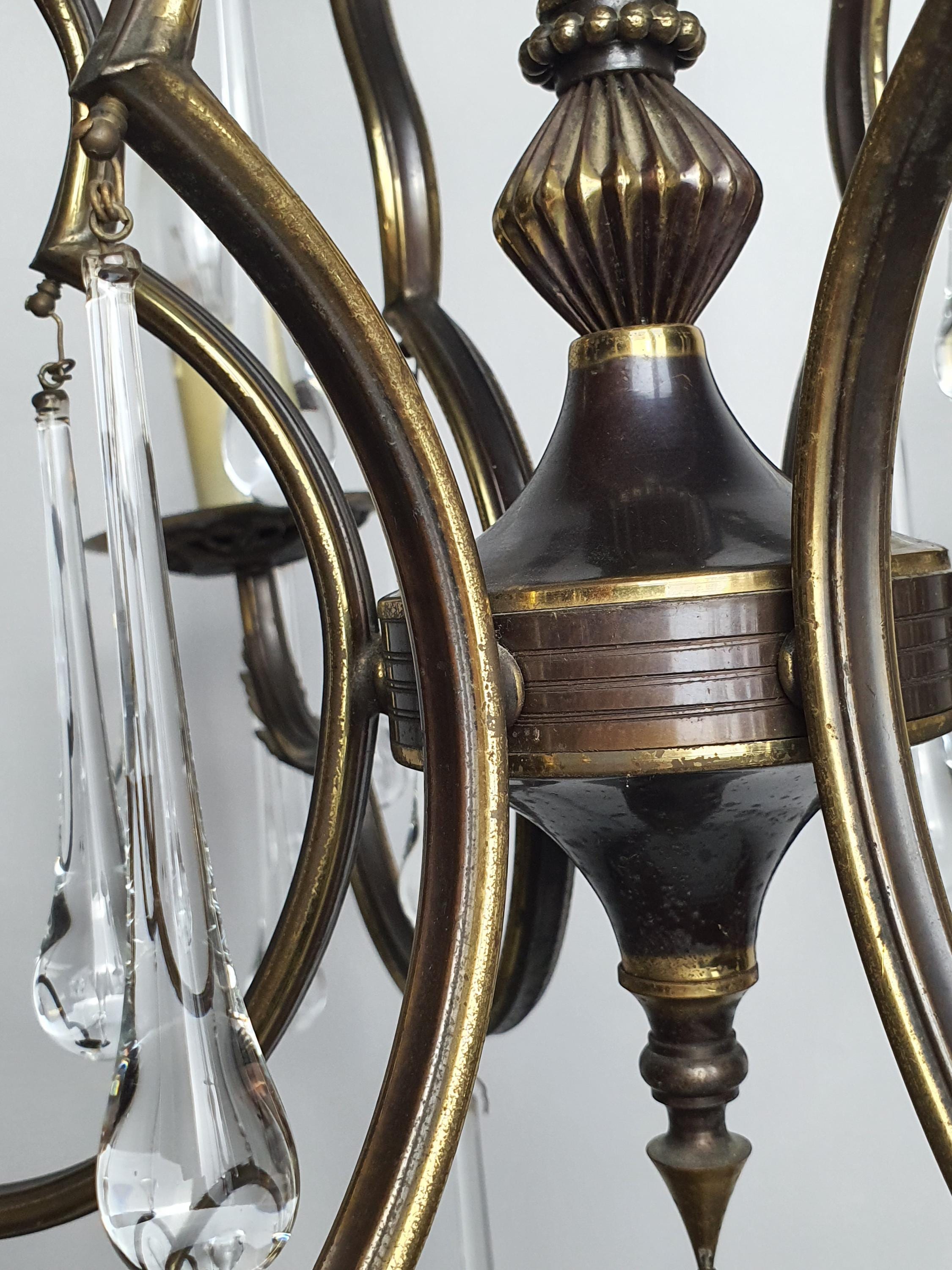 Vintage Italian brass Murano teardrop chandelier unlit, showing full 56×74cm cascading silhouette and clear glass drops