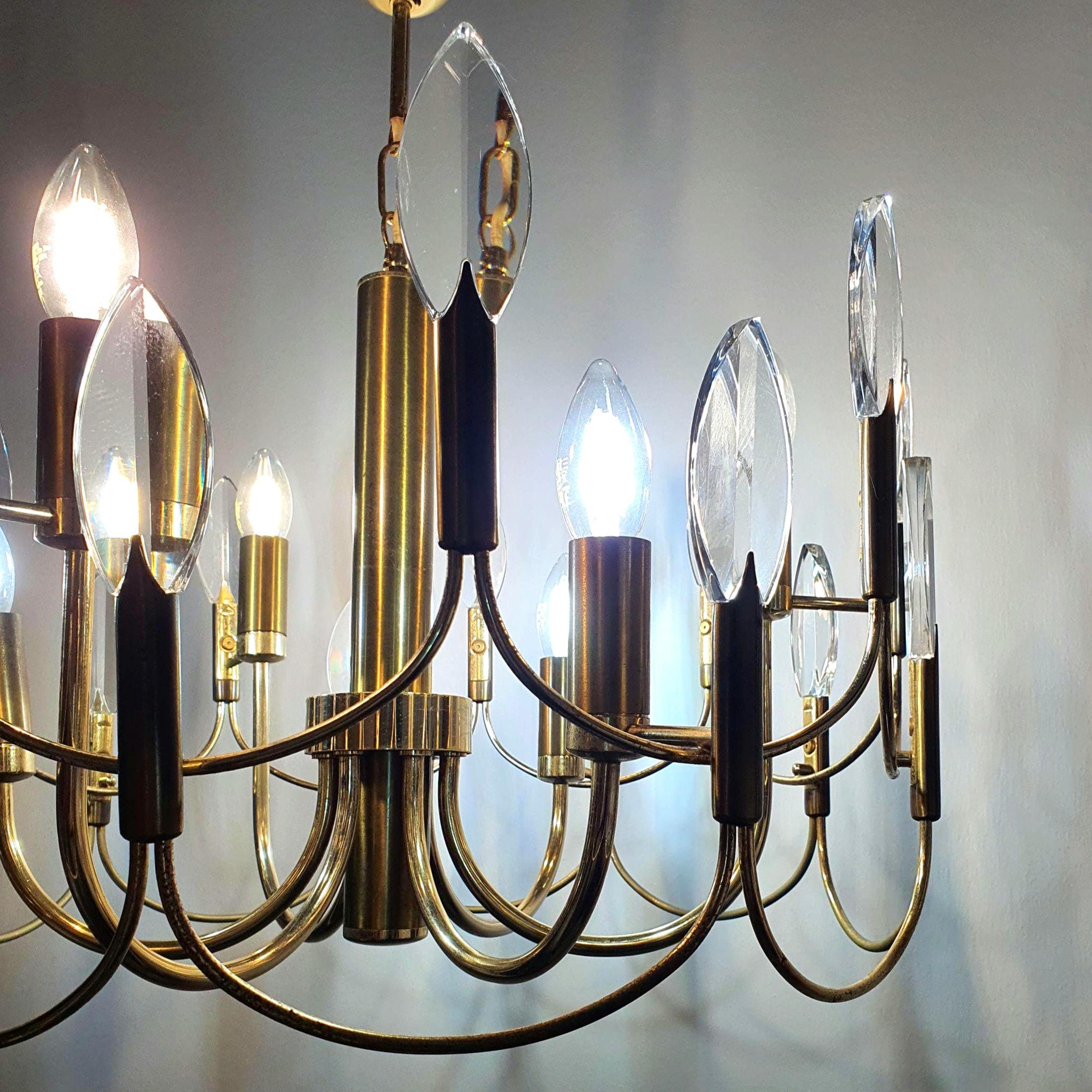 Vintage brass and crystal 6-arm chandelier attributed to Gaetano Sciolari, double-wave motif, crystal drops, Italy 1960s–1970s