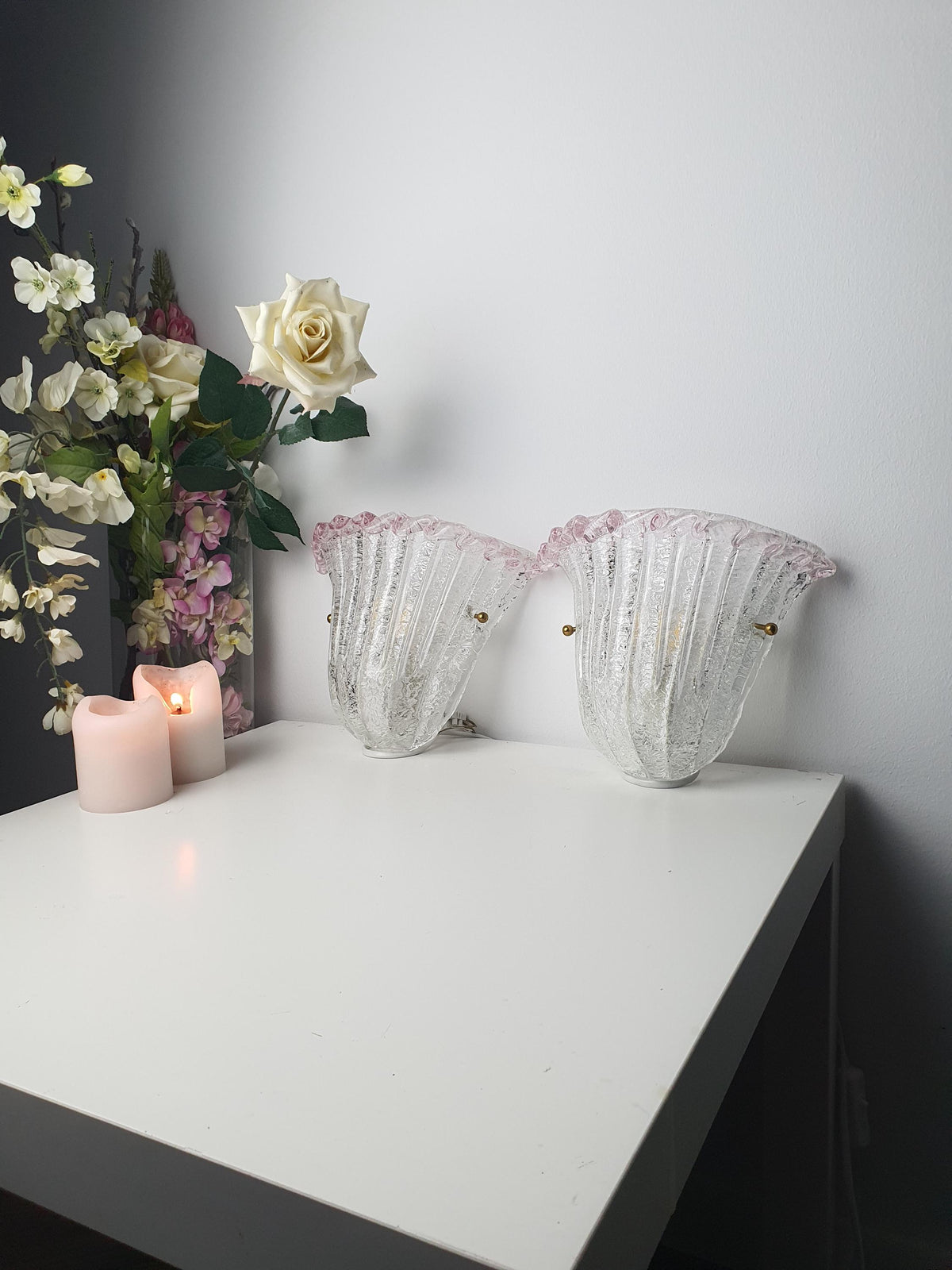 Pair of 1980s Italian glass sconces with clear centres and pink ice-glass edges
