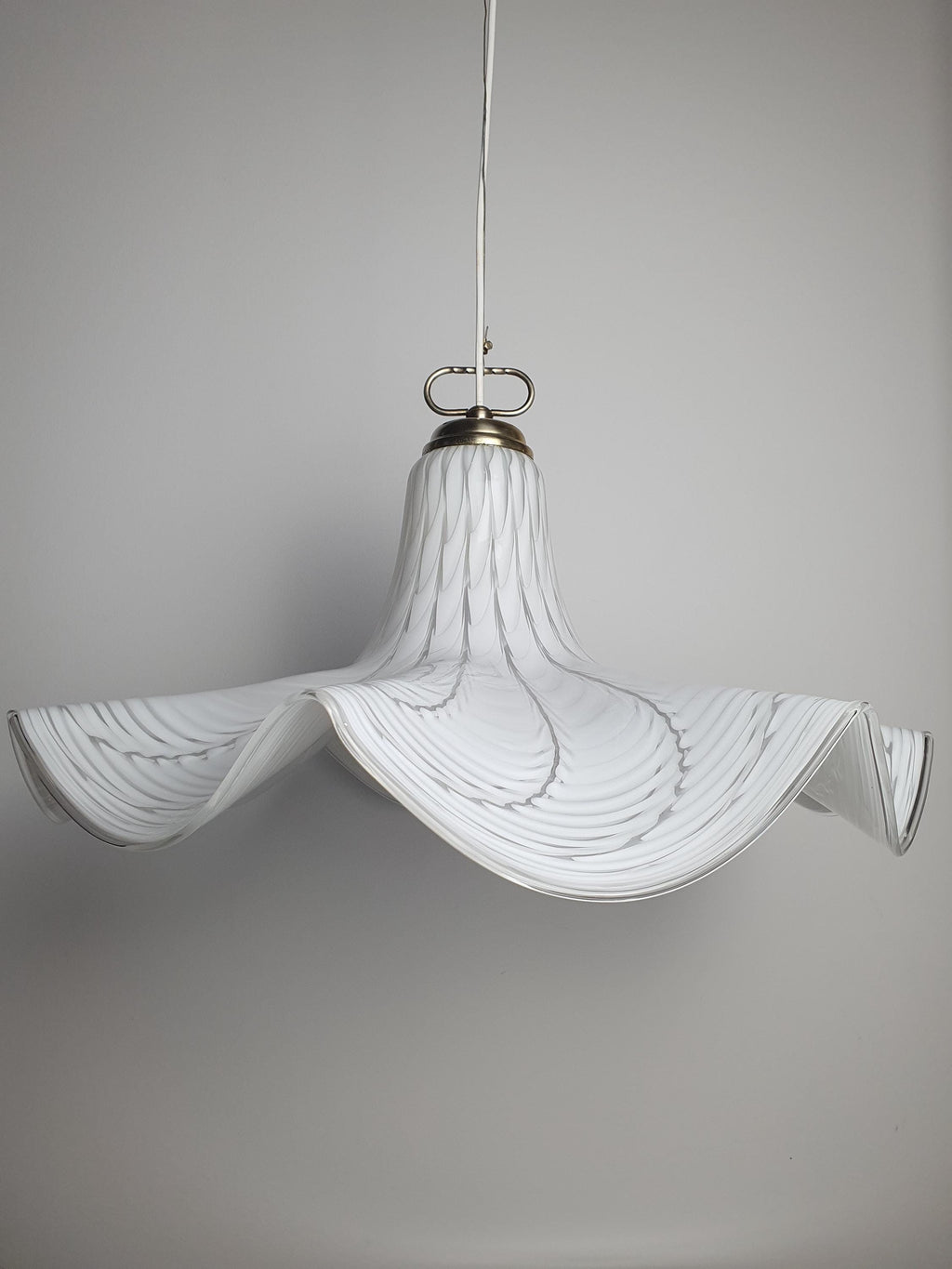 Gold-toned metal fitting detail, professionally rewired vintage Murano glass Fazzoletto pendant