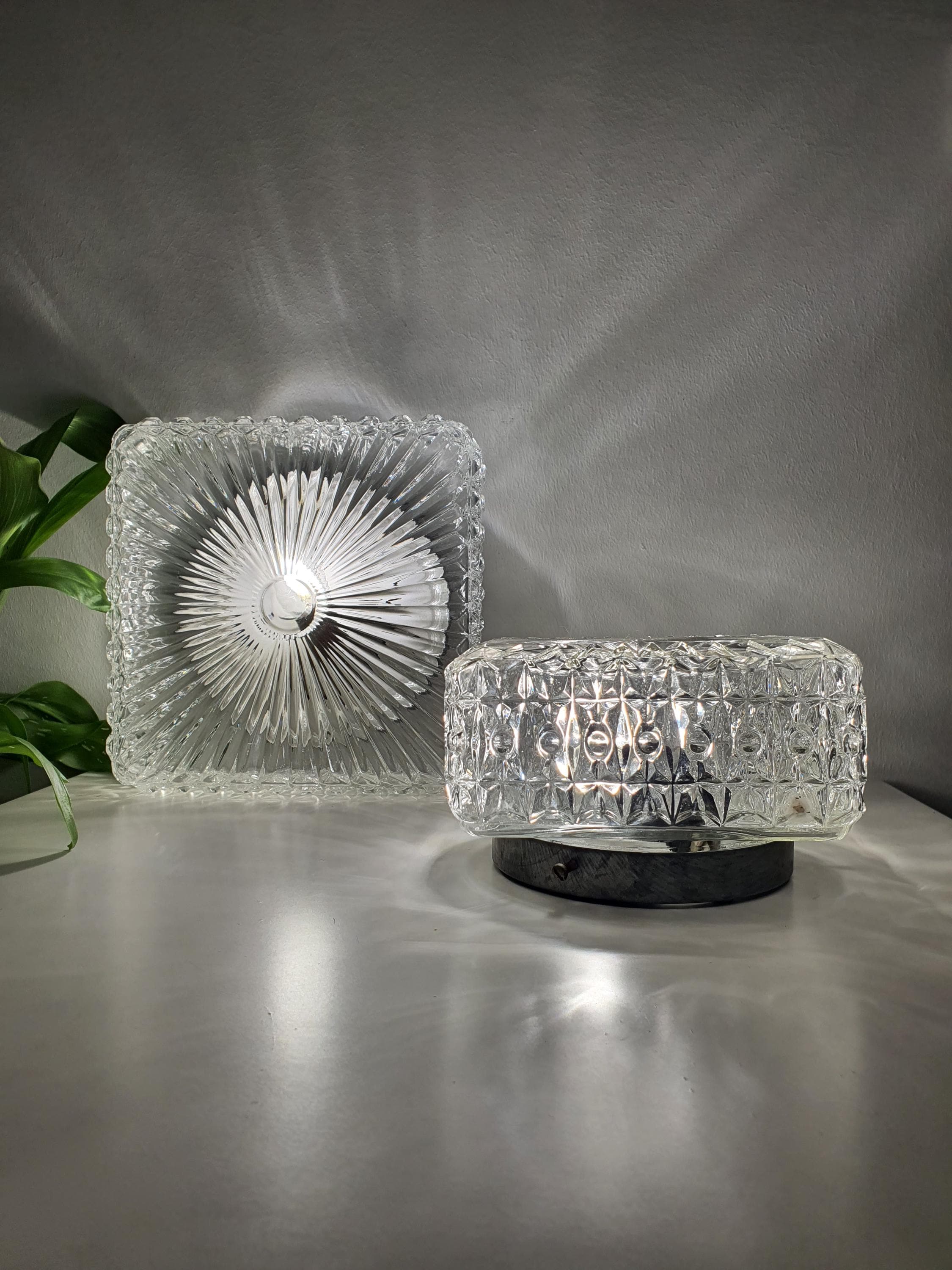 Set of 2 Brutalist MCM Midcentury wall sconces in stamped clear glass