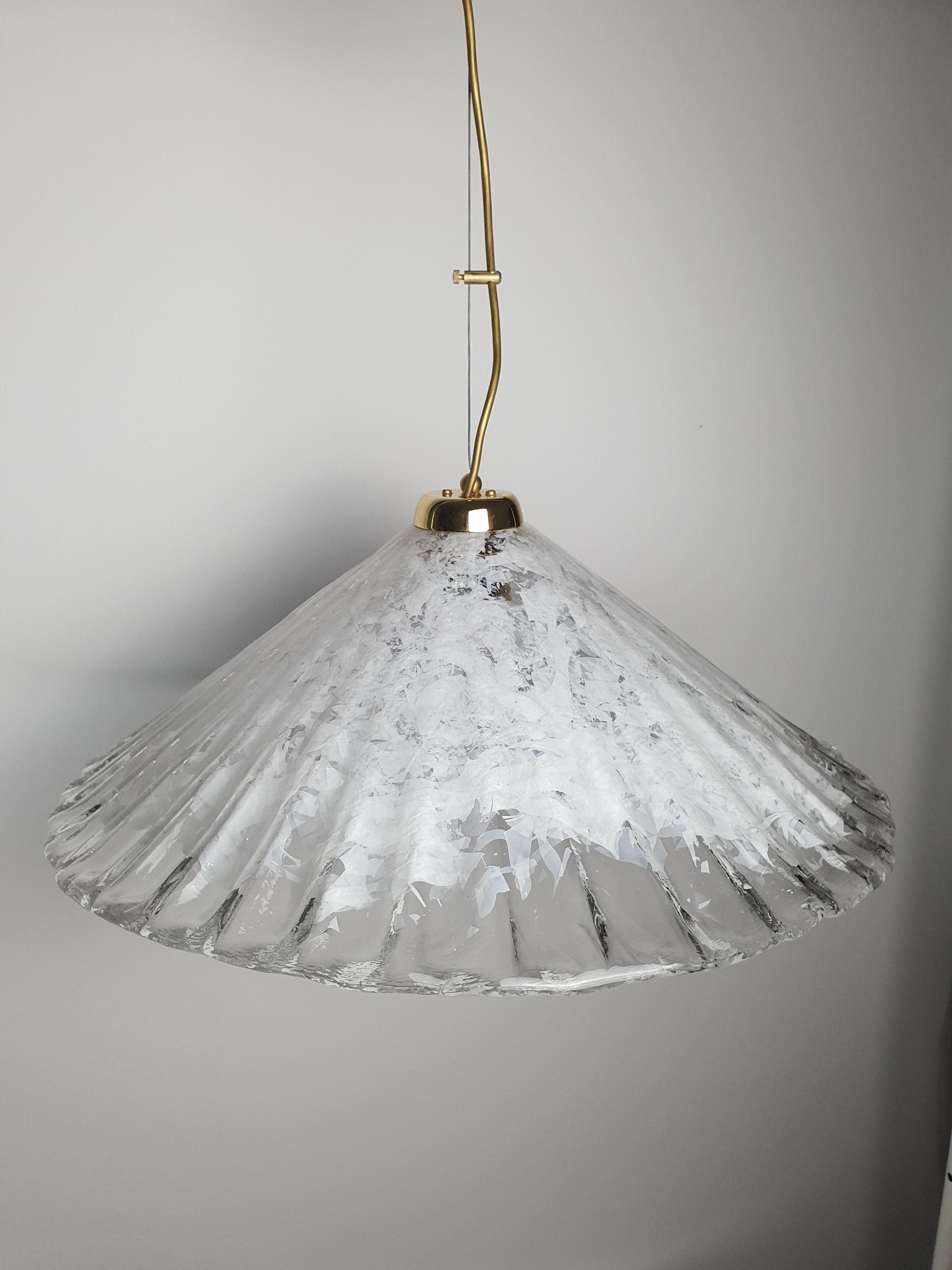 Vintage Italian shell-form Murano glass pendant lit, warm diffused glow through clear and white layered shade