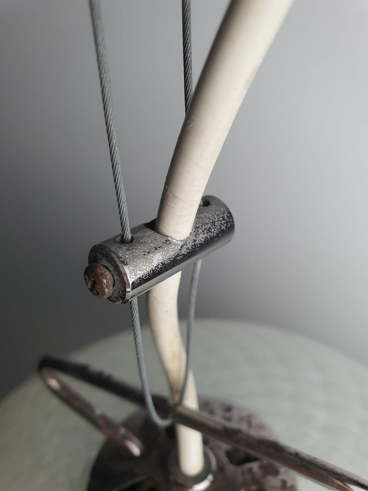 Dark chrome metal fittings on a vintage Murano glass pendant
