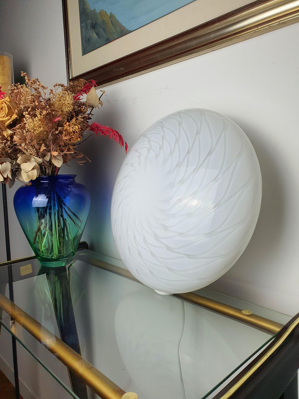 White swirl glass detailing on a vintage Italian ceiling light