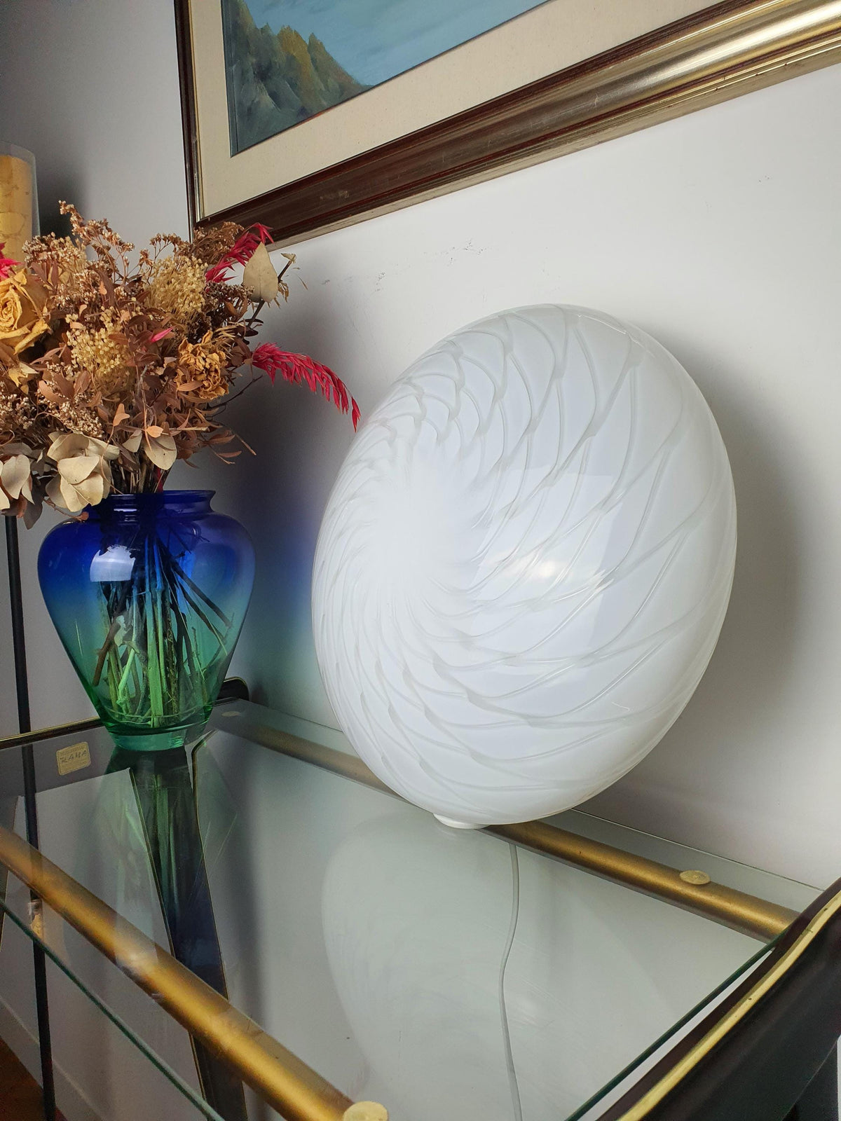 White swirl glass detailing on a vintage Italian ceiling light