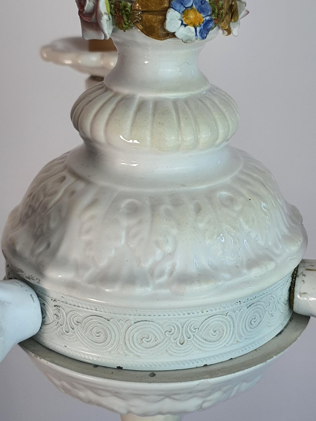 Sculptural white ceramic branches with handcrafted porcelain floral decoration
