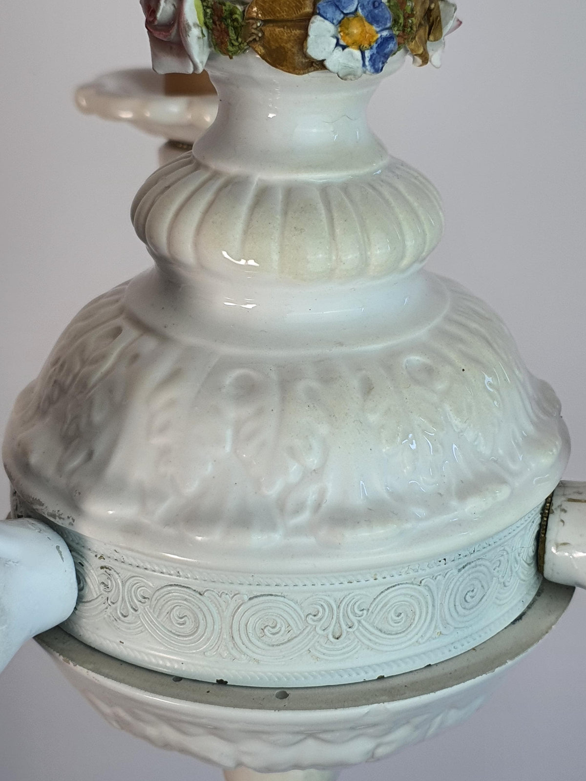 Sculptural white ceramic branches with handcrafted porcelain floral decoration
