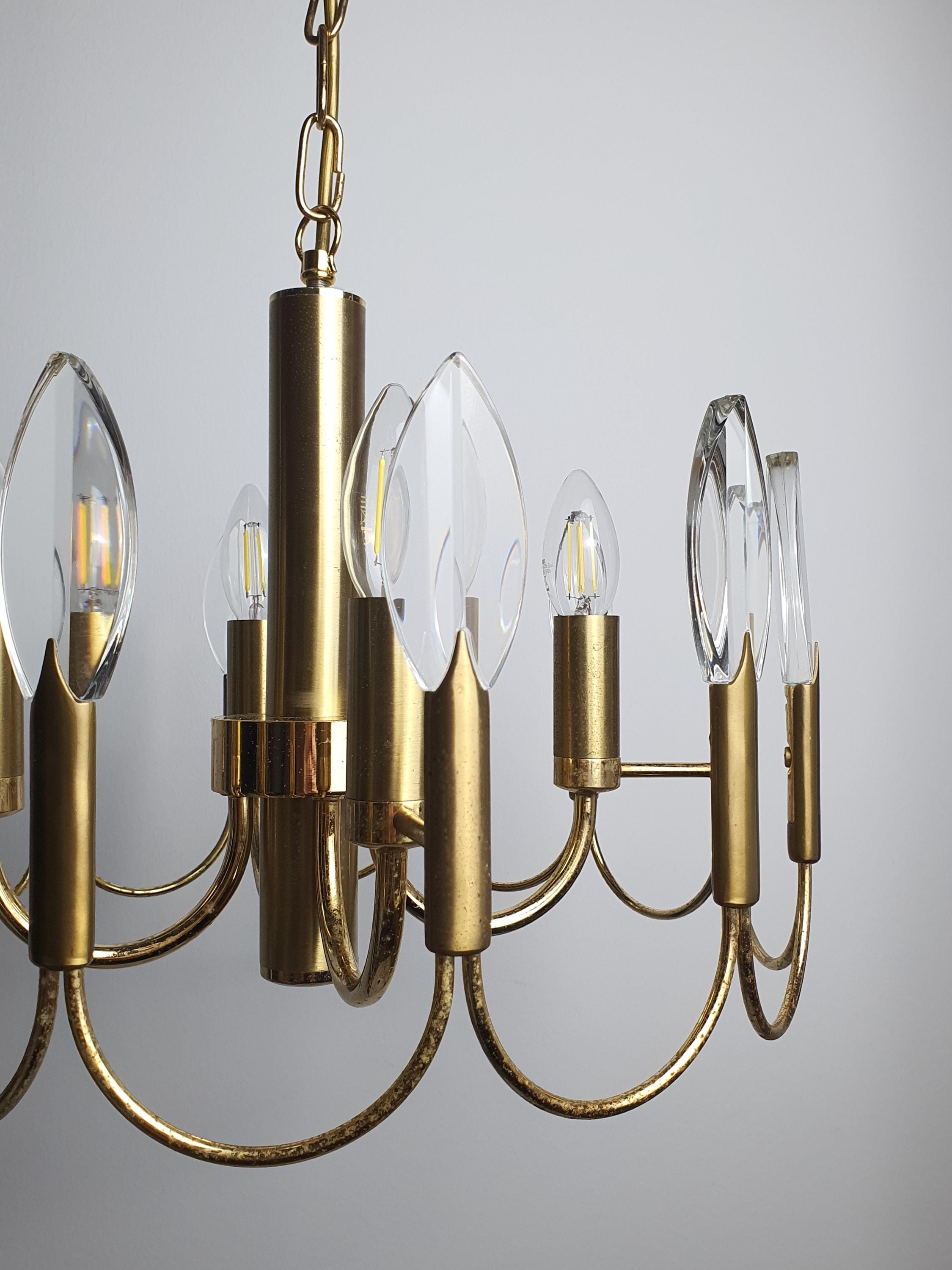 Brass oxidation and patina detail on vintage Italian 4-arm chandelier attributed to Gaetano Sciolari, 1960s–1970s